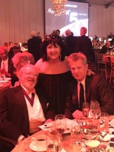 From left to right: longtime museum supporter, Bruce McCaw, columnist for the Puget Sound Business Journal, Patti Payne and David Foster